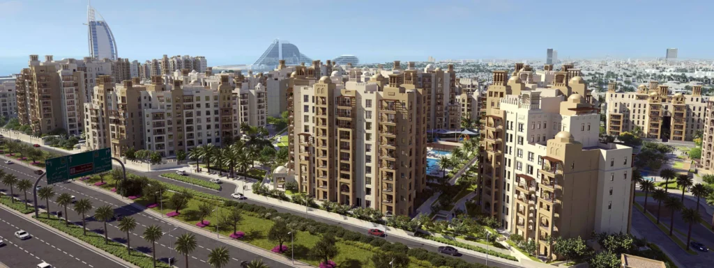 Panoramic view of Al Jazi apartment blocks along the road at Madinat Jumeirah Living (developer rendering)