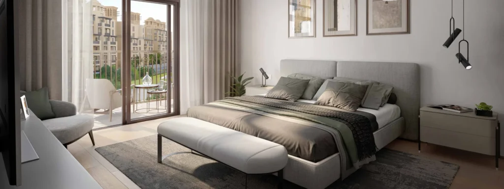 Al Jazi apartment master bedroom with upholstered bed and floor-to-ceiling windows (developer rendering)