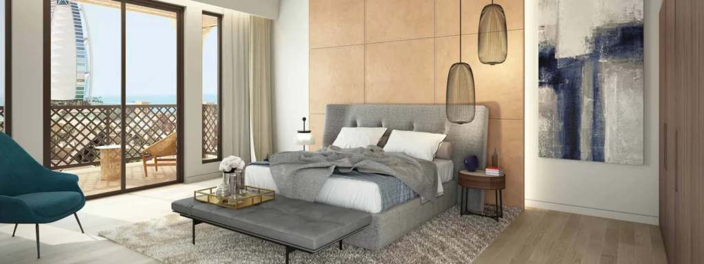 Lamtara apartment bedroom with balcony access and city light (developer rendering)