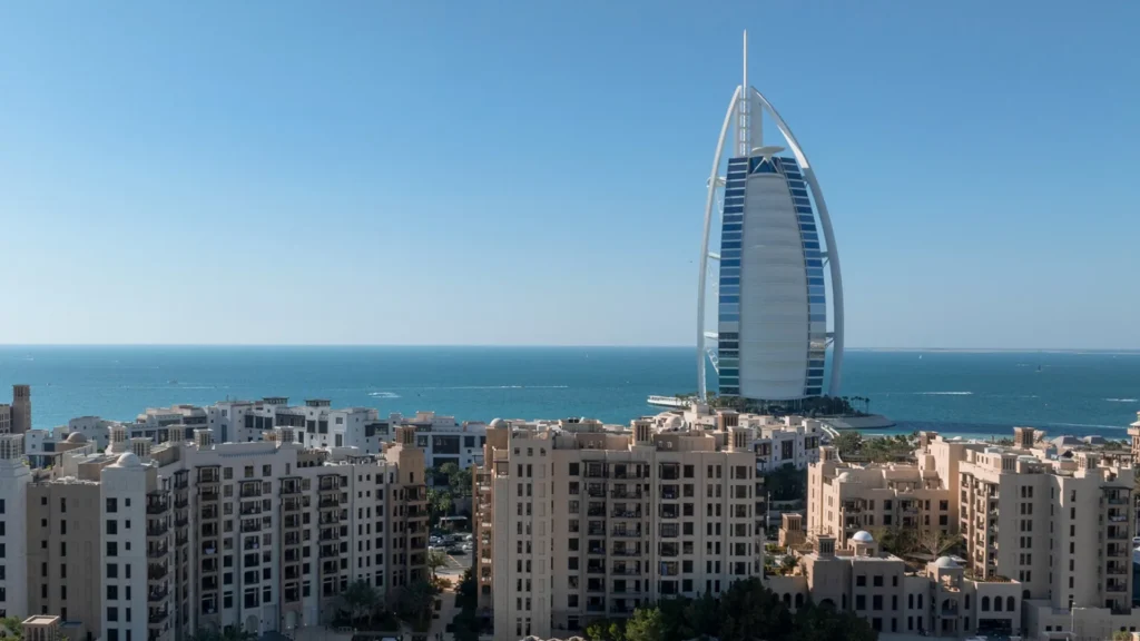 Madinat Jumeirah Living residential buildings in Umm Suqeim with Burj Al Arab and the sea behind