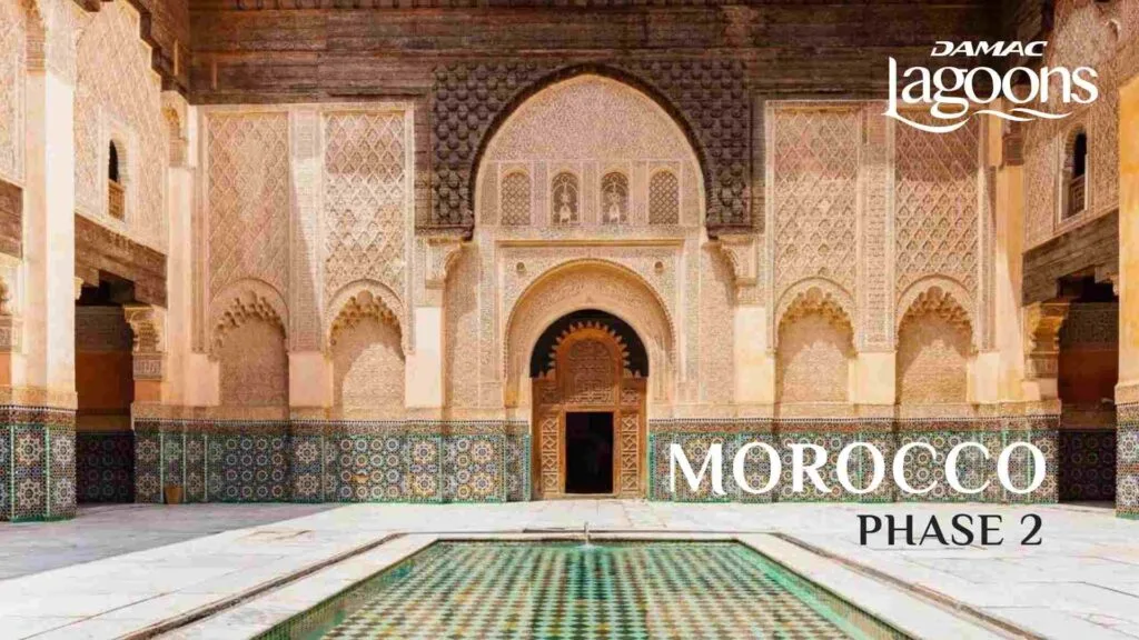 Moroccan style courtyard with decorative arches and tiled pool