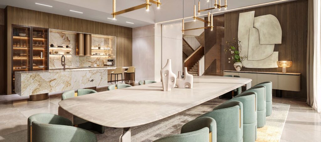 Interior dining area with large table and kitchen in background