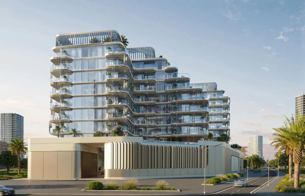 Modern multi-story residential building with glass balconies