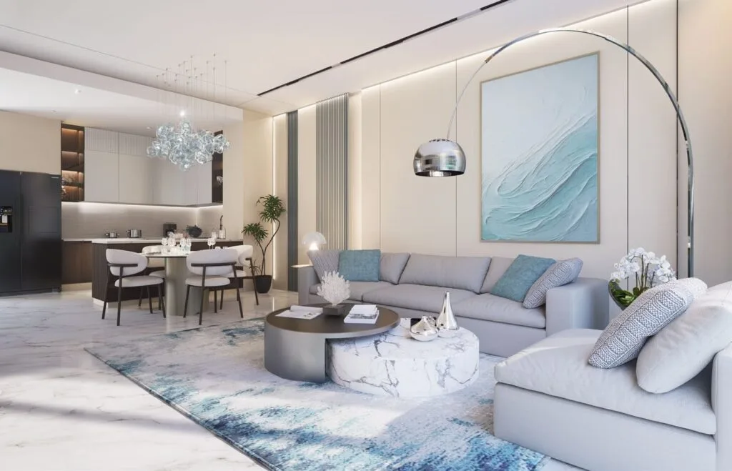 Modern open-plan living room and kitchen interior with blue accents