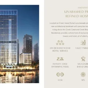 Exterior view of two tall residential towers by waterfront