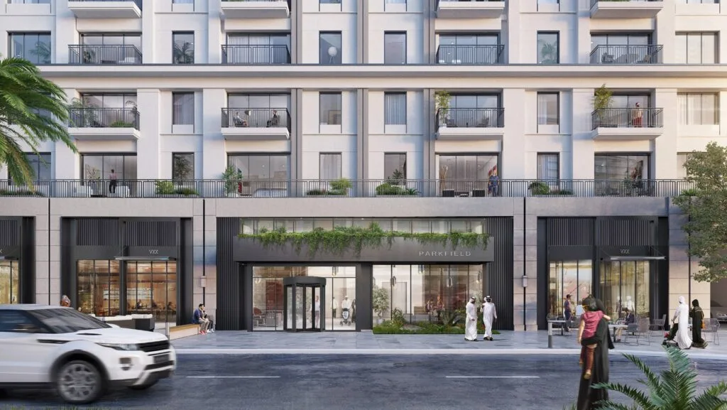 Exterior view of modern residential building with street and pedestrians
