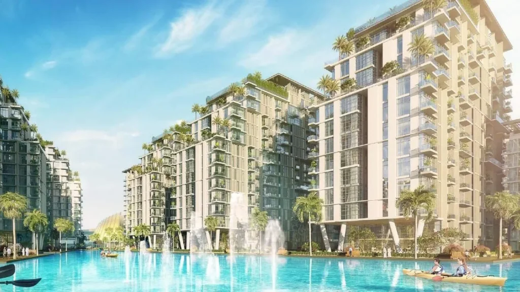 Фасады жилых зданий с бассейном и пальмами в районе Dubai South проекта Azizi Venice 7
