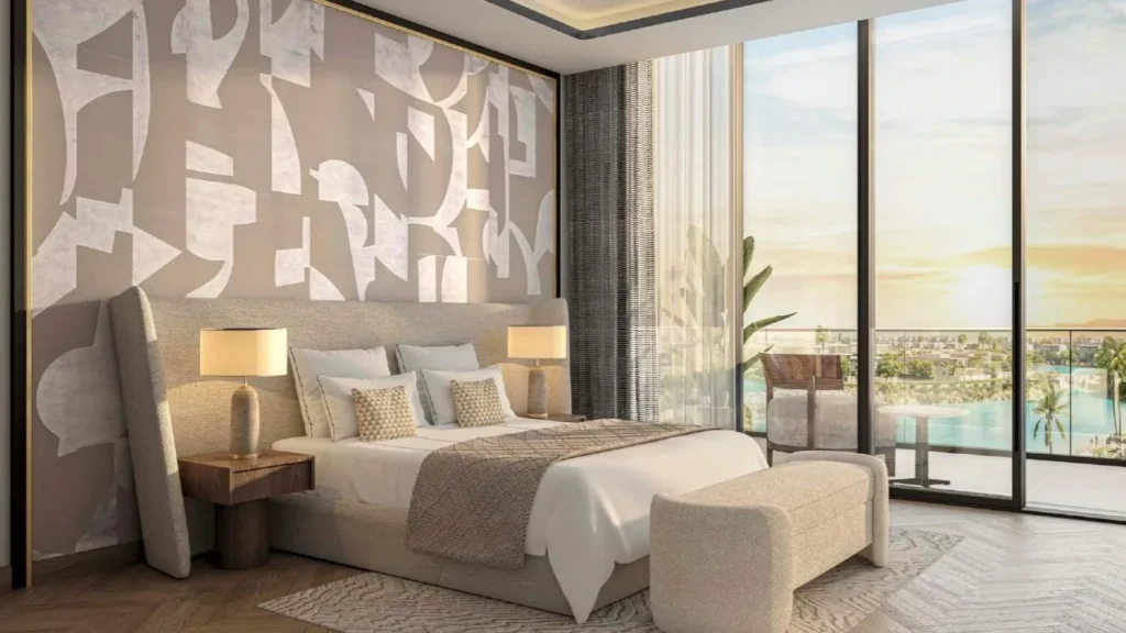 Спальня с панорамным окном и видом на бассейн в Azizi Venice 7 Dubai South