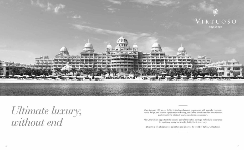 Large beachfront hotel building with domes and palm trees