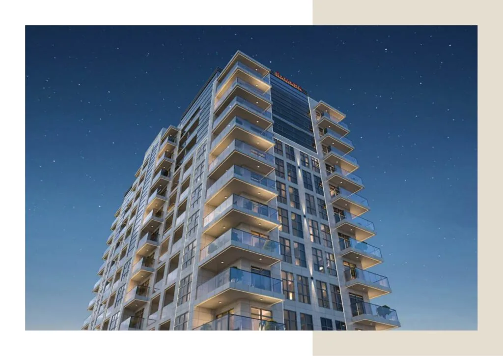 Exterior night view of a multi-story residential building with balconies