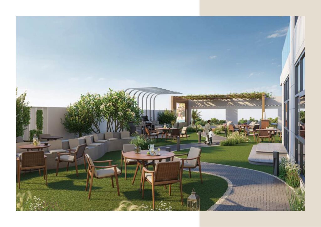 Outdoor seating area with tables, chairs, and pergola on rooftop