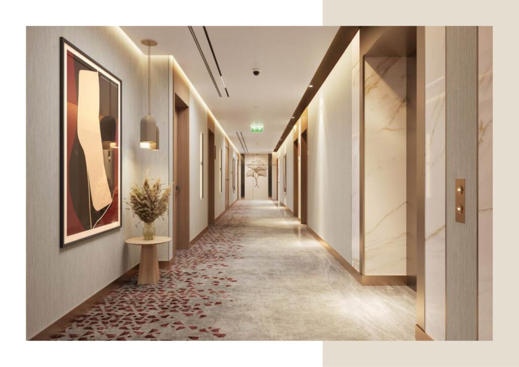 Interior corridor with artwork, lighting, and elevator doors