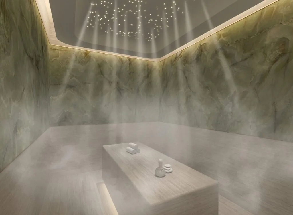 steam room interior with stone walls and ceiling lights