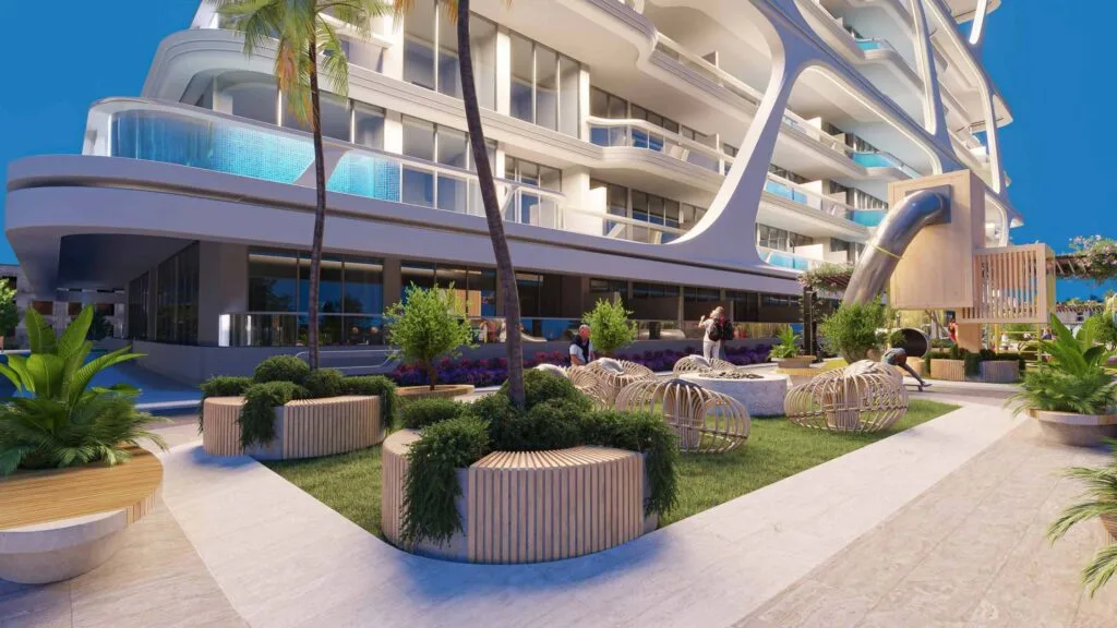 Exterior view of modern building with garden seating and pool