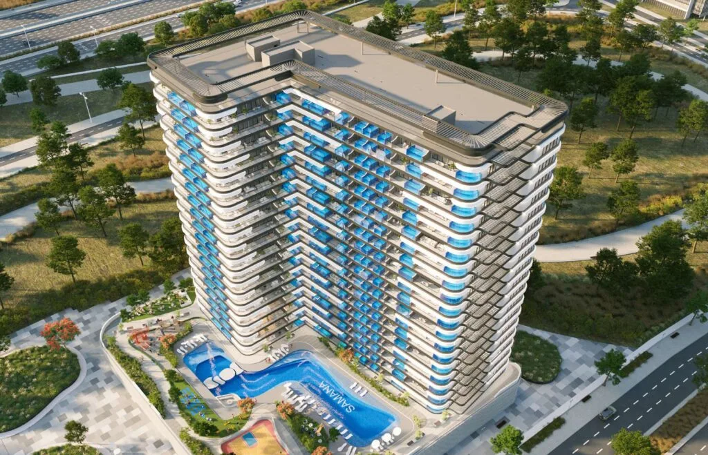 High-rise residential building with blue balconies and pool