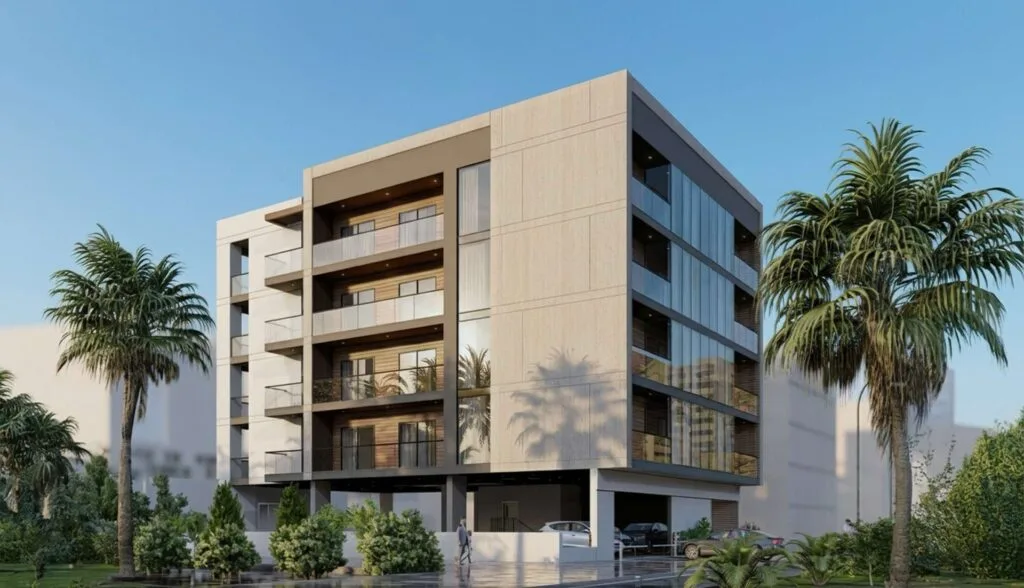 Modern mid-rise residential building with balconies and palm trees