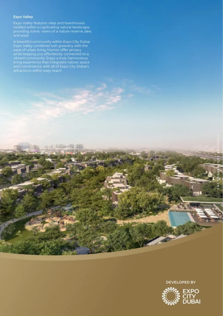 Aerial view of villas and townhouses surrounded by greenery