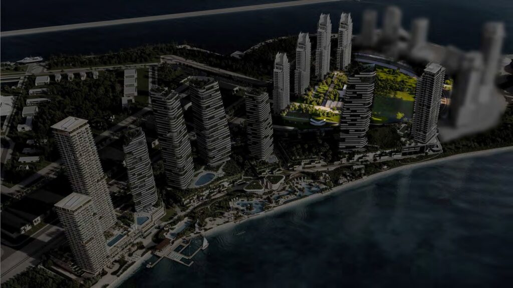 Aerial view of multiple high-rise buildings near waterfront
