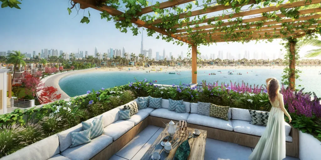 Townhouse pergola terrace with sofas overlooking the bay and Dubai skyline (developer rendering)
