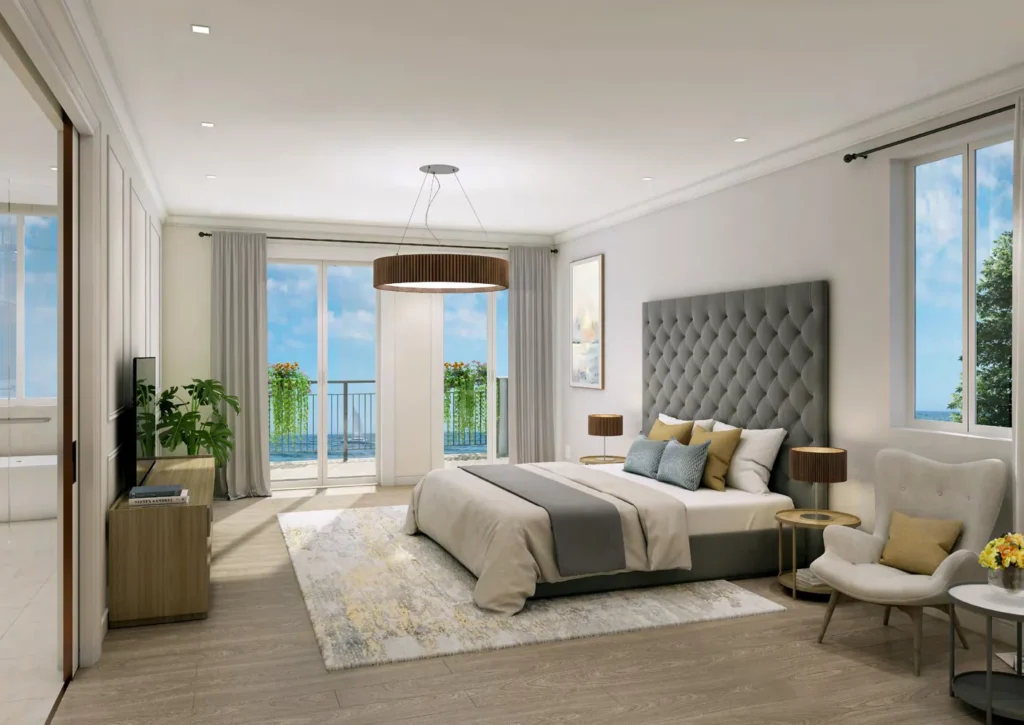 Townhouse master bedroom with upholstered headboard and balcony access (developer rendering)