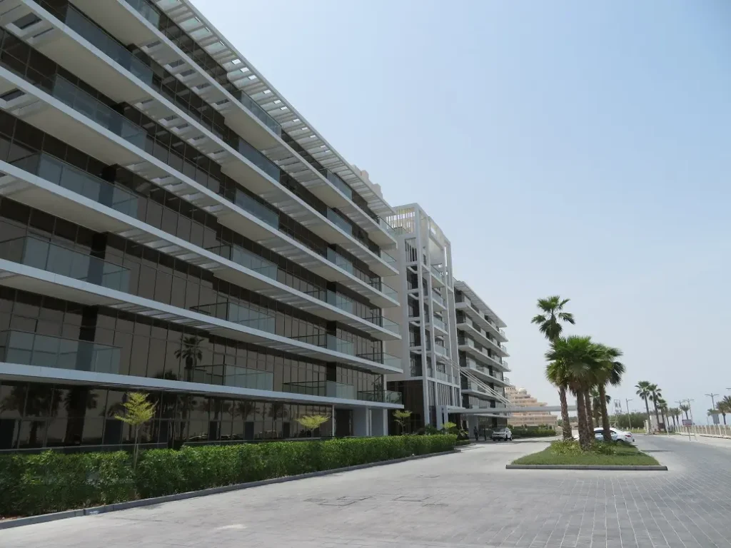 building along landscaped road, The 8, Palm Jumeirah, Dubai