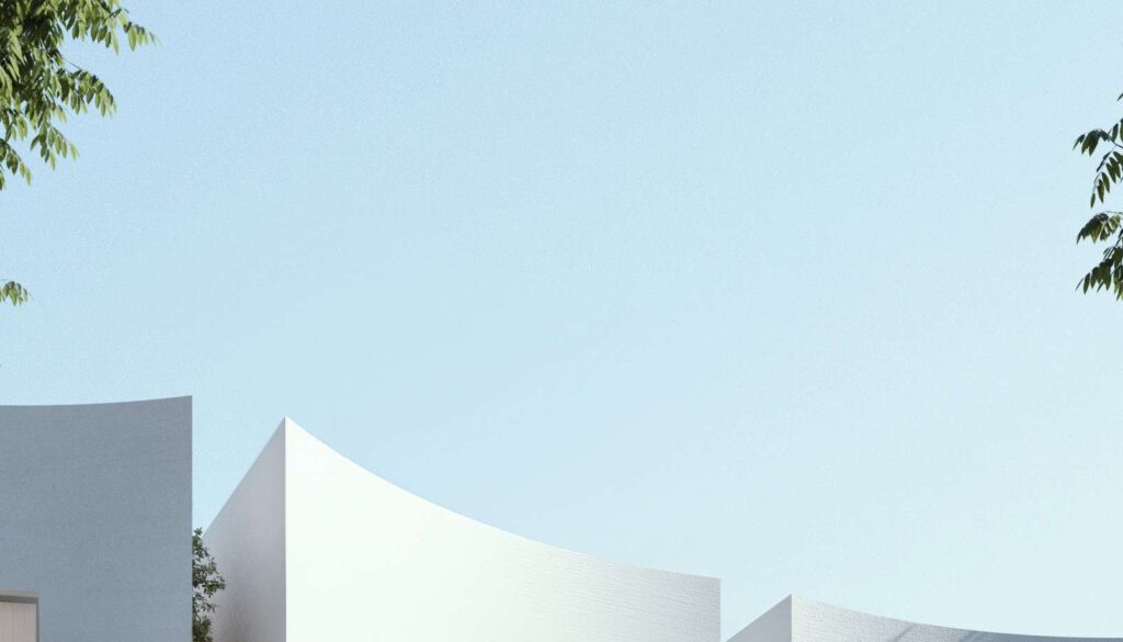 Exterior view of modern villa buildings under clear sky