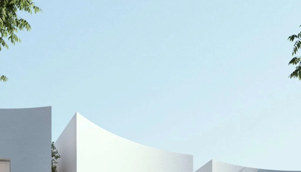 Exterior view of modern villa buildings under clear sky
