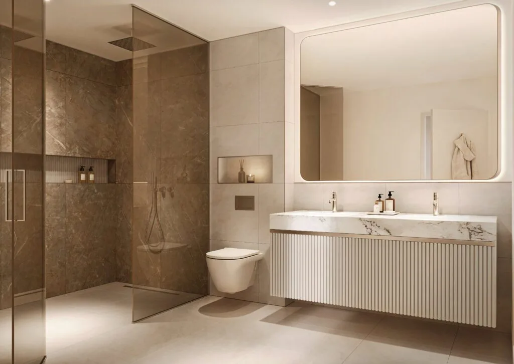 modern bathroom with double sink and glass shower enclosure