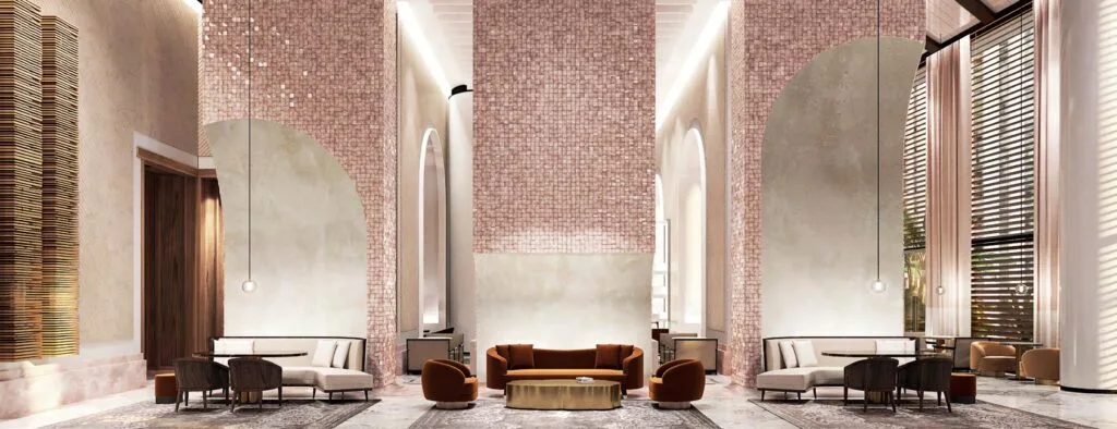 Interior lounge area with high ceilings and seating arrangements
