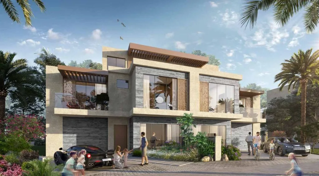 Exterior view of a modern two-story villa with palm trees