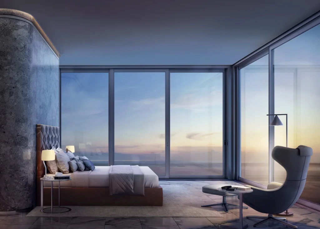 Bedroom with floor-to-ceiling windows in The One JBR (developer rendering)