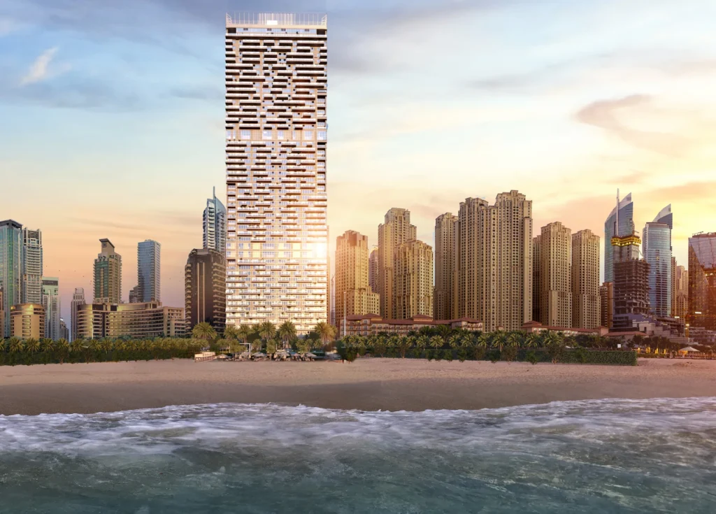 The One JBR tower rising above the JBR waterfront at sunset (developer rendering)