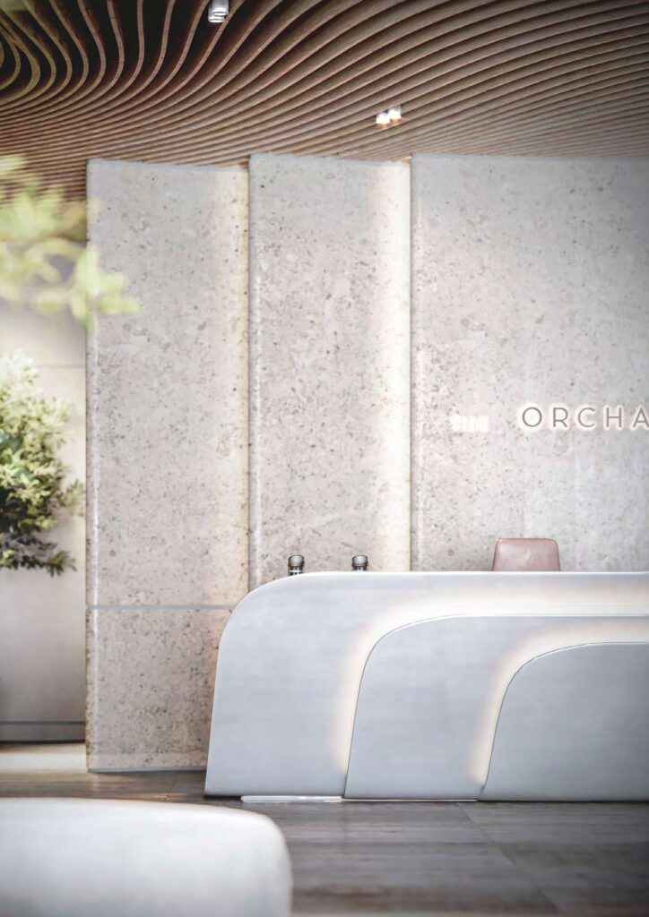 Reception area with modern curved desk and textured wall