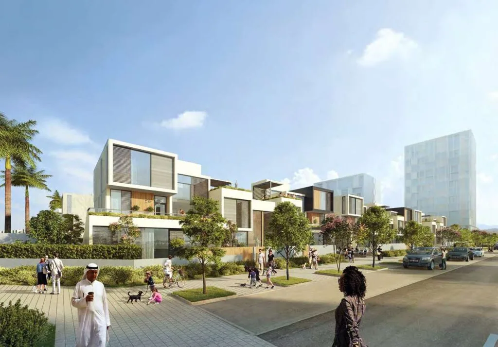 Modern townhouses with street, trees, and people walking
