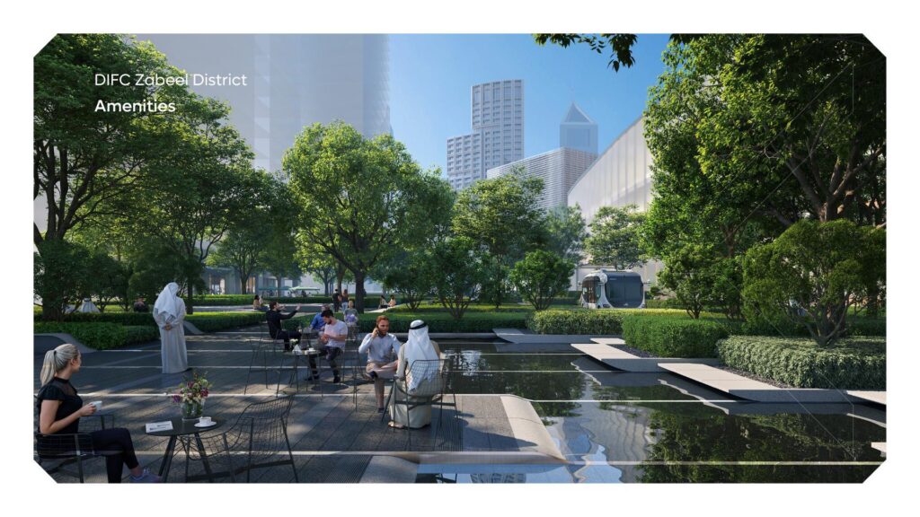 Outdoor seating area with trees and water feature in urban district
