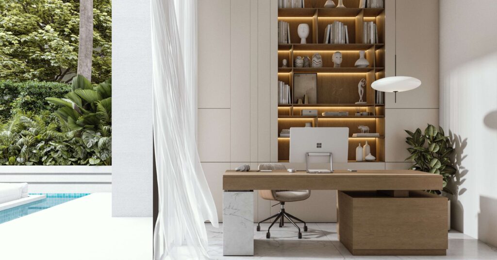Modern office interior with desk, chair, and bookshelf