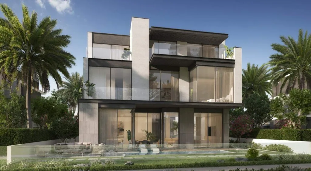 Modern three-story residential building with glass balconies