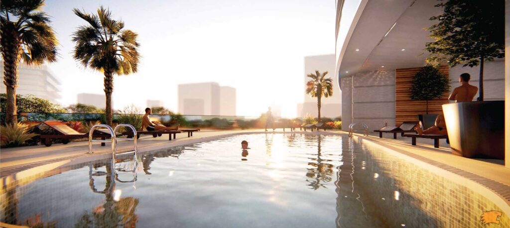 Poolside area with palm trees and lounge chairs