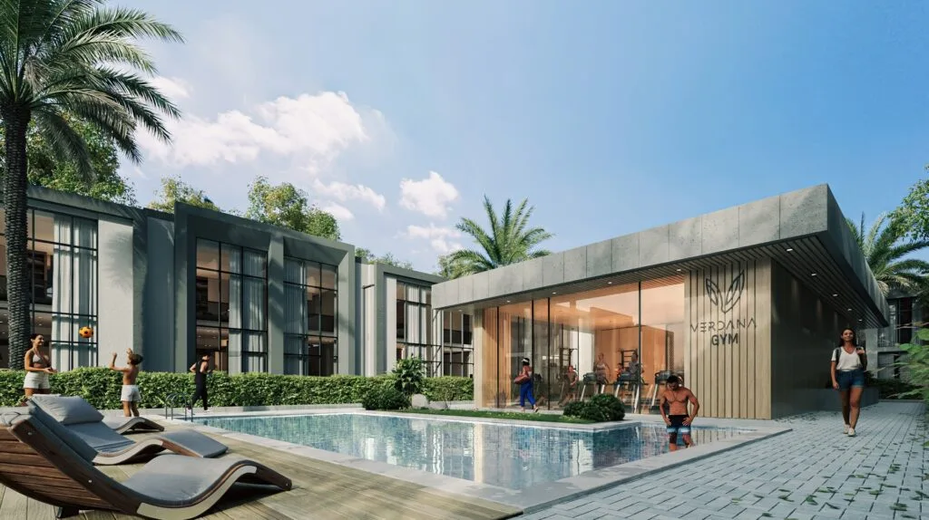 Exterior view of building with pool and people around