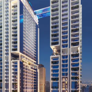 Viewz by Danube — twin towers with sky bridge, night facade