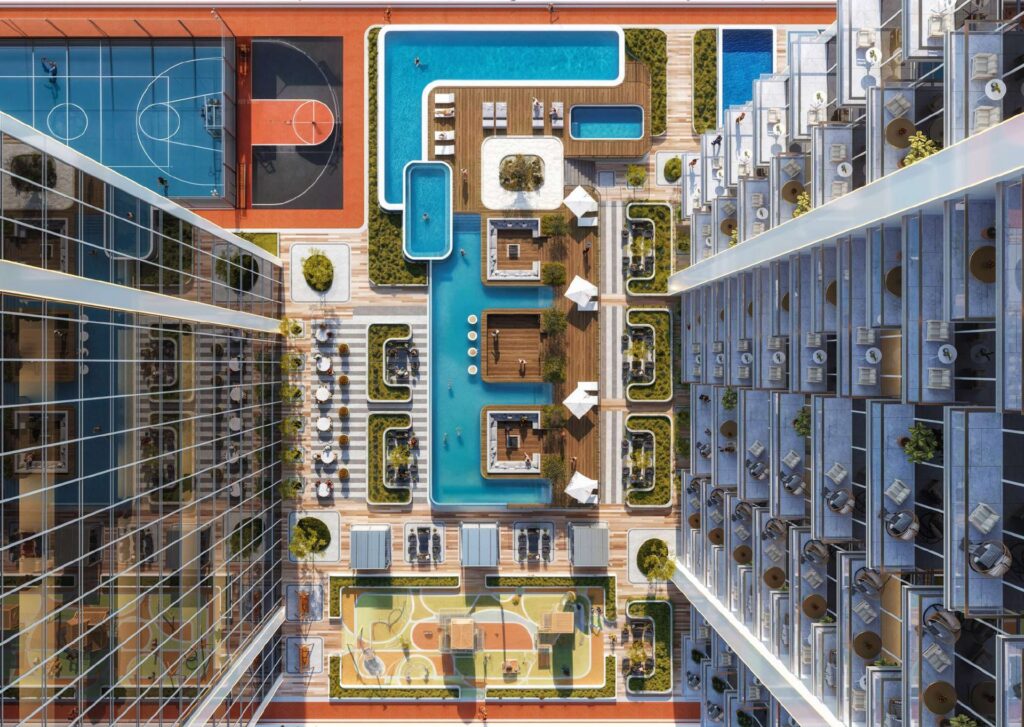 Aerial view of residential towers with pool and sports courts