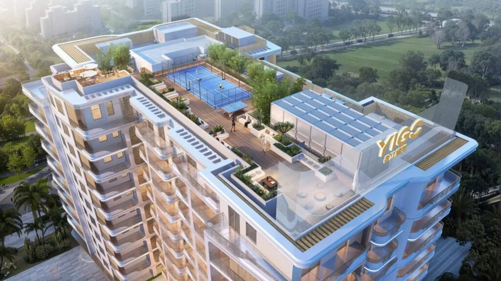 Aerial view of a residential building rooftop with padel court and seating areas